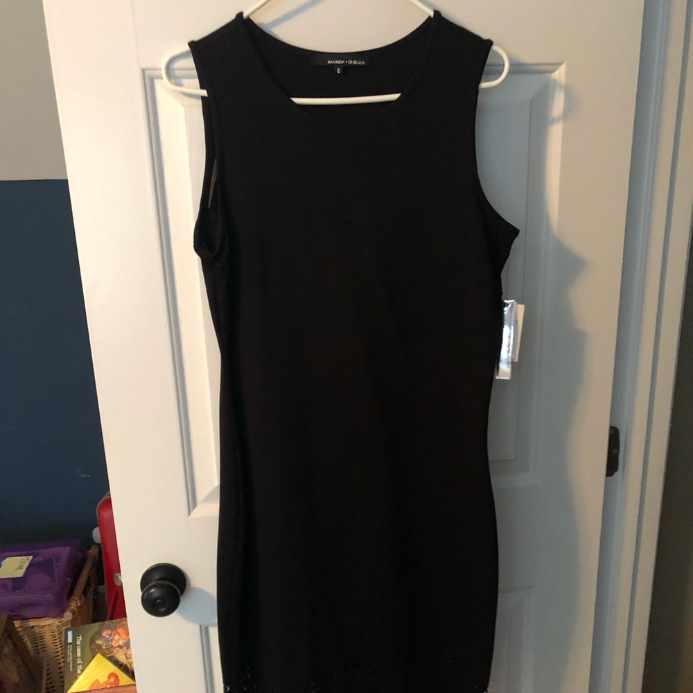 Black sleeveless dress. Never worn